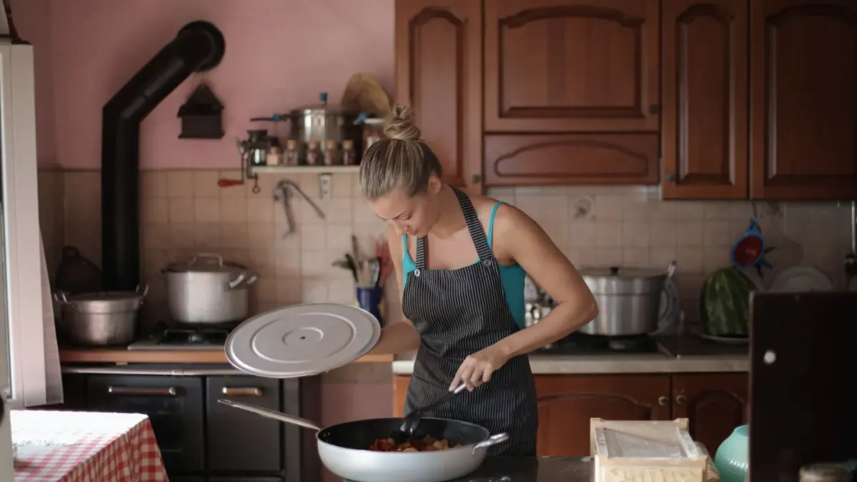 Dog owner preparing a meal
