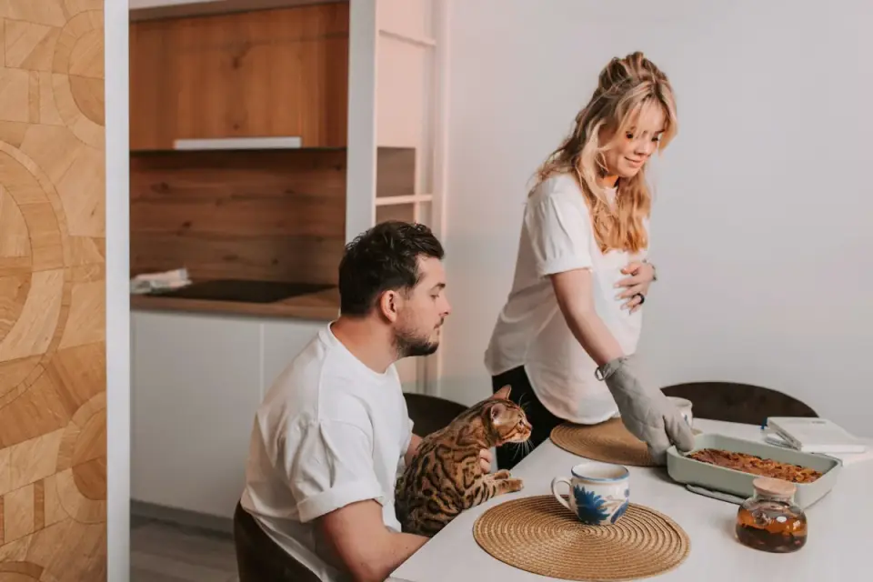 Dog owner preparing a meal