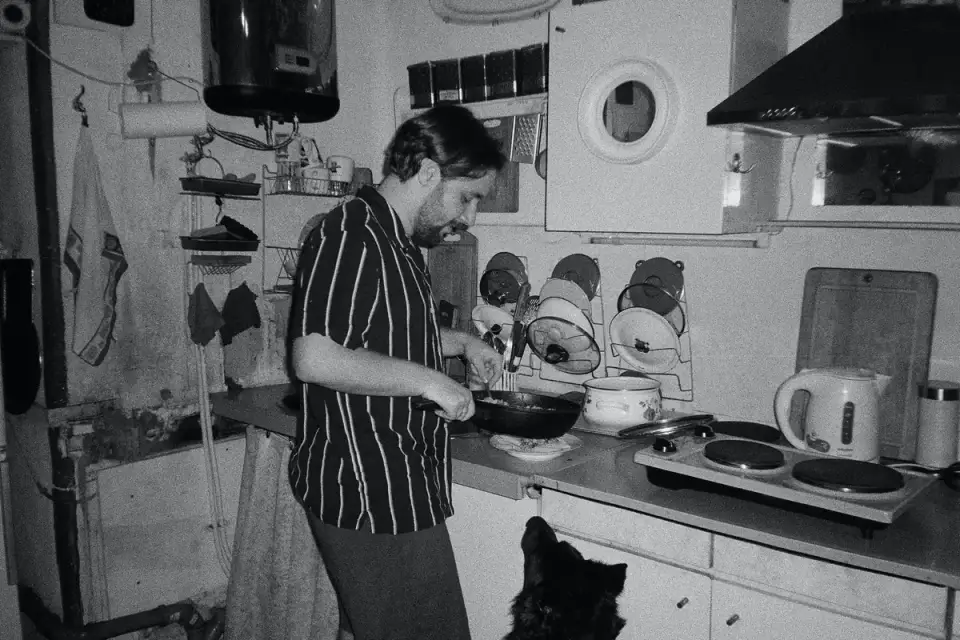 Dog owner preparing a meal
