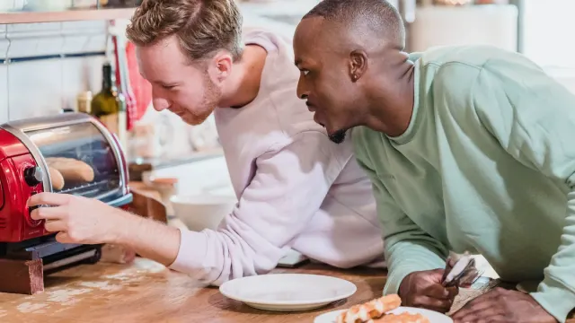 Dog owner preparing a meal