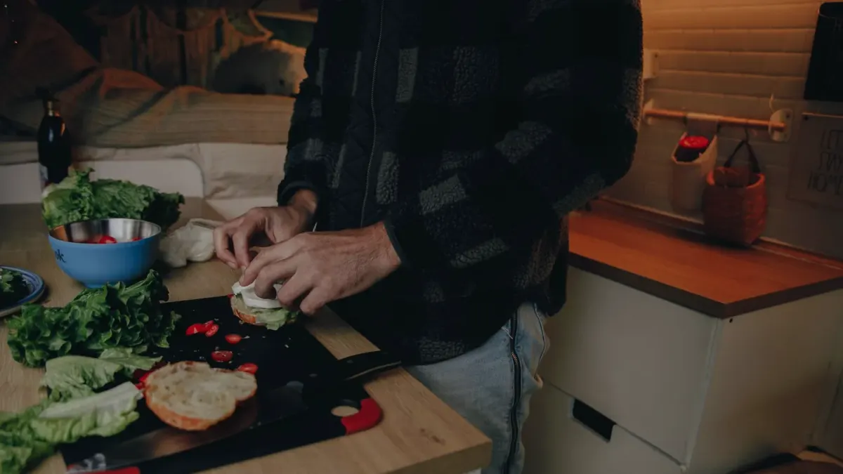 Dog owner preparing a meal