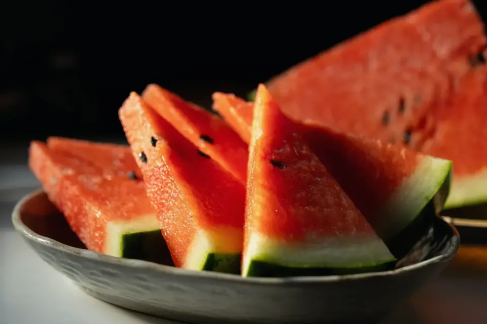 Small cubed pieces of watermelon with rind and seeds removed on a plate